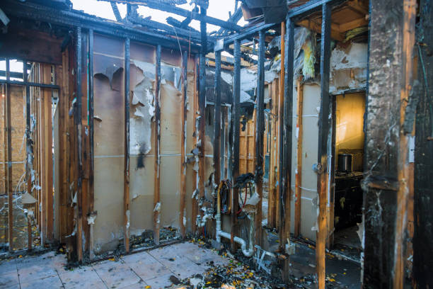 Professional Fire Damage Restoration technician working in Strum, WI